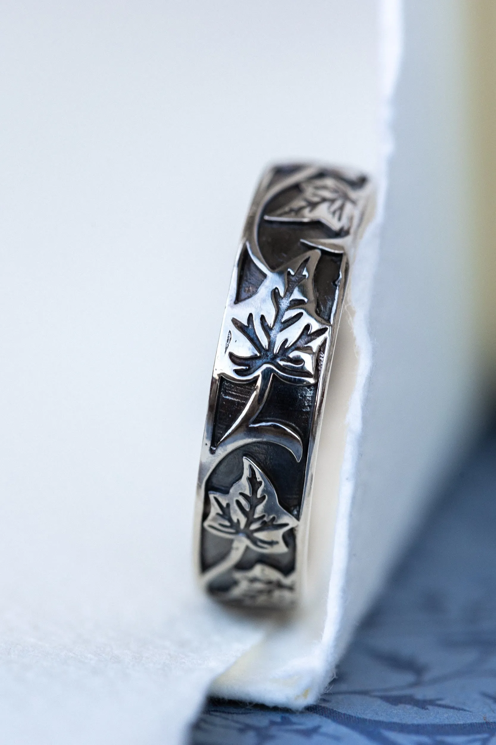 Black and gold wedding band for man, ivy leaves ring