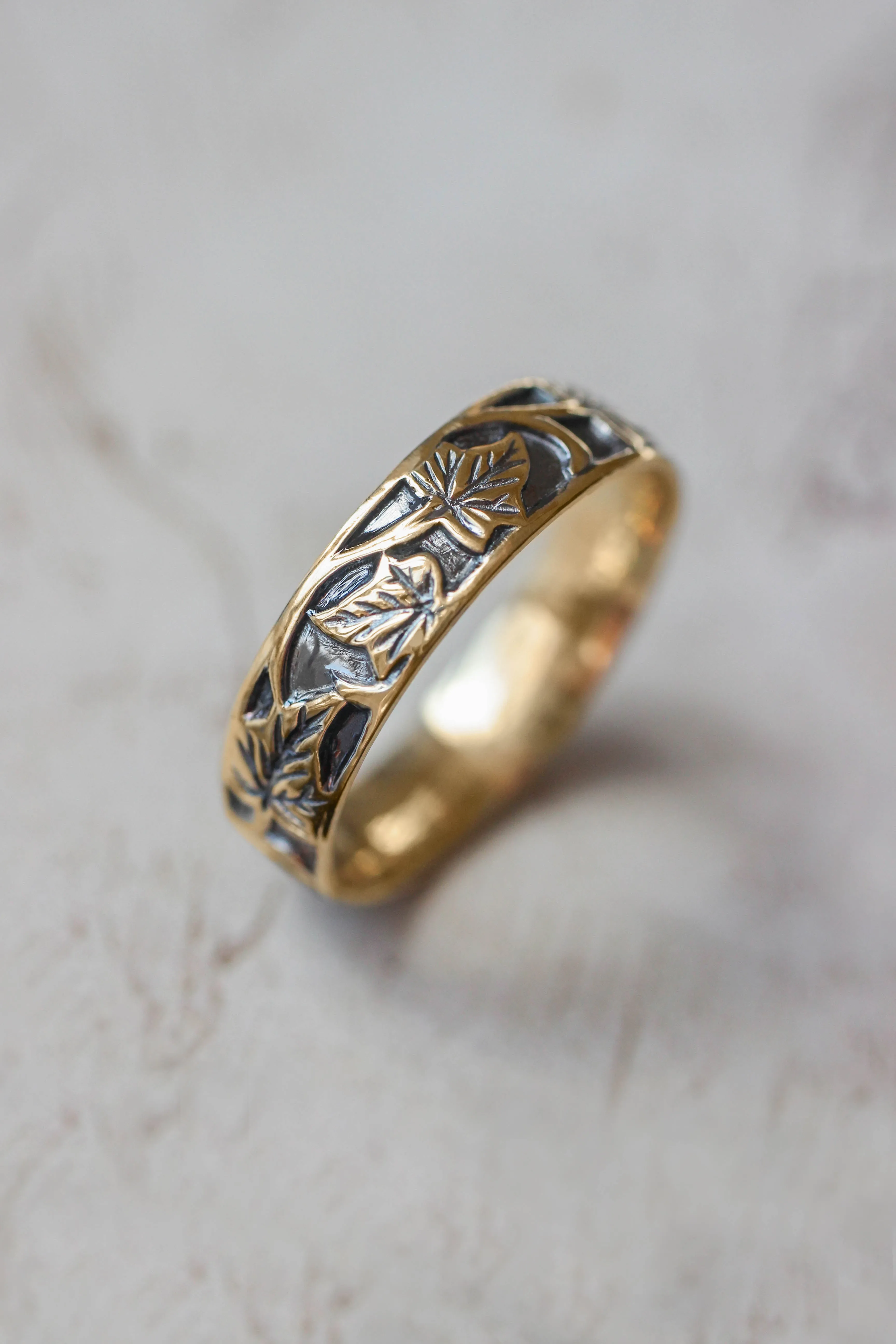 Black and gold wedding band for man, ivy leaves ring